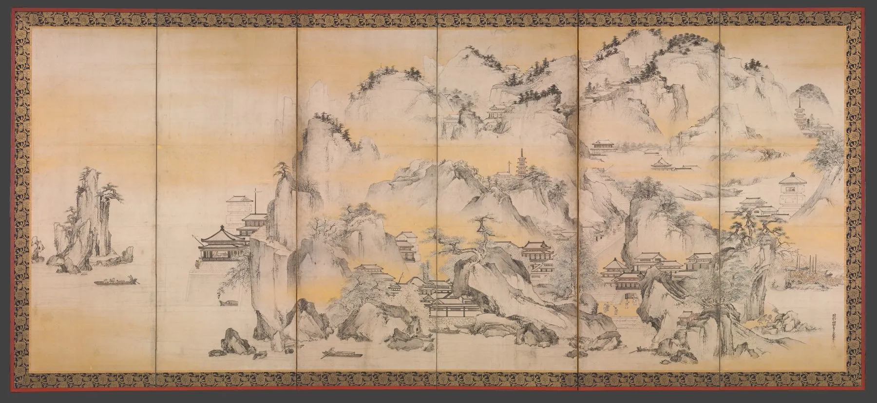 A gold-washed folding screen in ink: a rocky island in a misty river, its slopes crowded with temple halls, pavilions, bridges and a tall pagoda, with small boats on the water